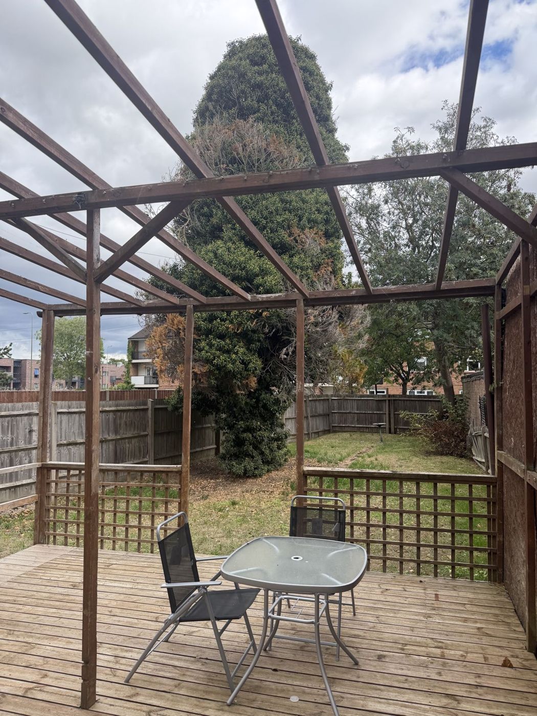 Rear decking with pergola and garden table