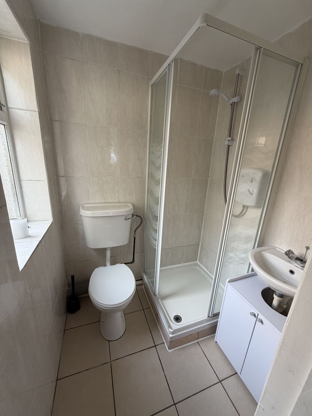 Shower room with WC and corner shower